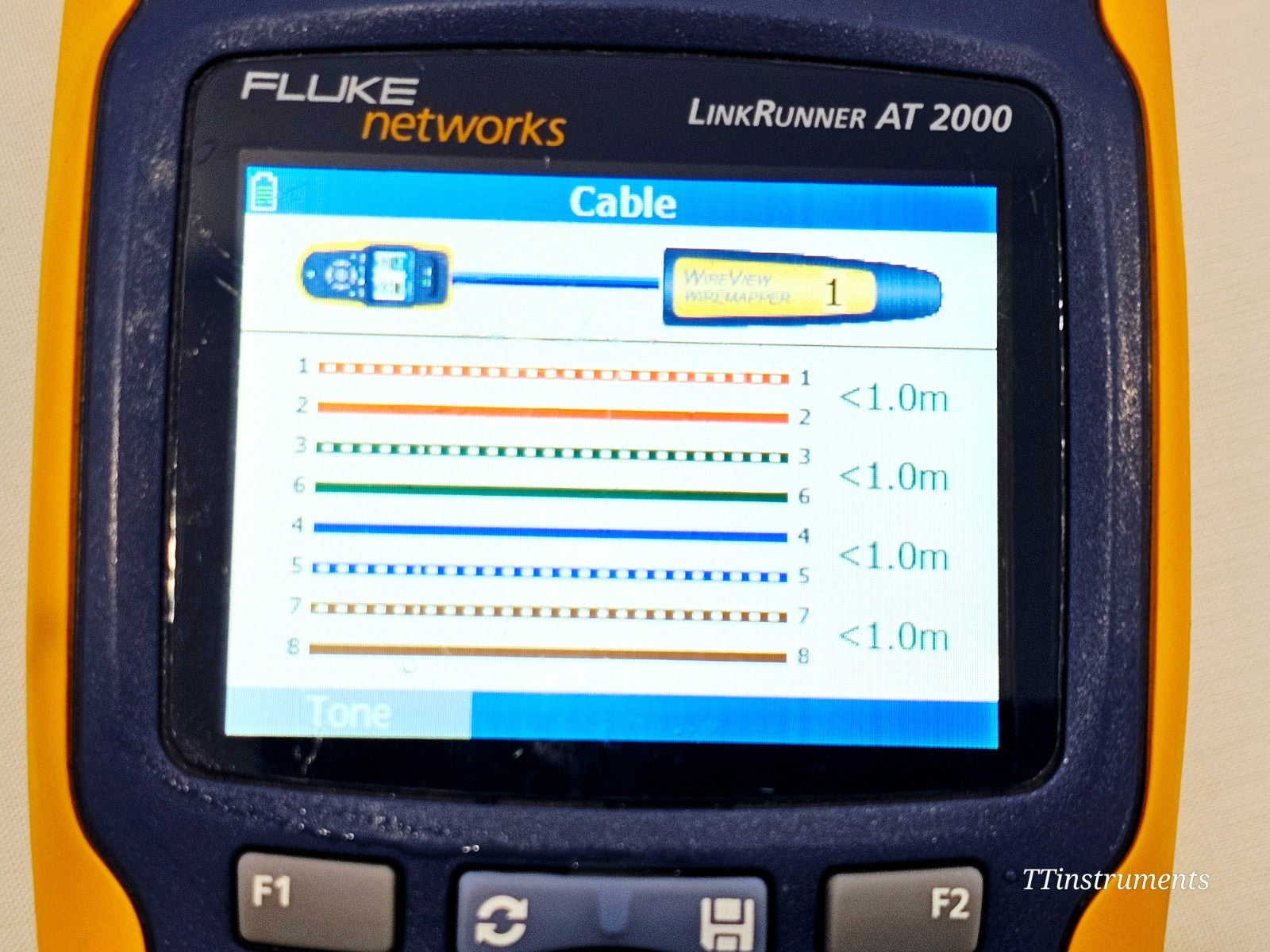 Fluke Networks network test device cosmetic condition showing minor wear on casing