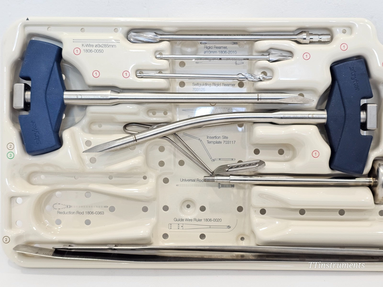 Stryker T2 Humerus Instrument Tray 1 — overhead view showing K-wire 1806-0050, rigid reamer, selfguiding reamer 703125, reduction rod 1806-0363, guide wire ruler 1806-0020