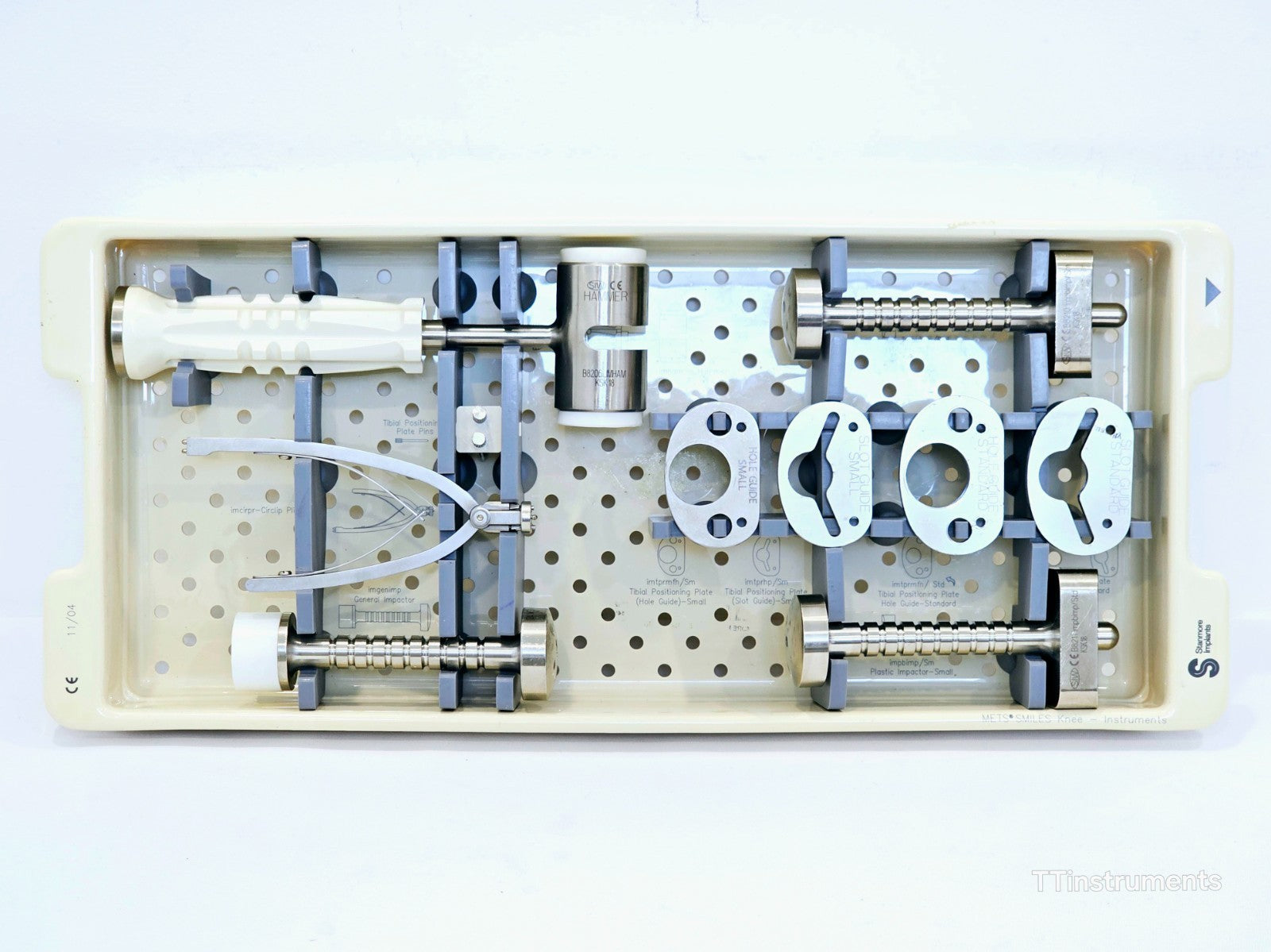 METS Smiles knee instrument set showing cutting guides and trials