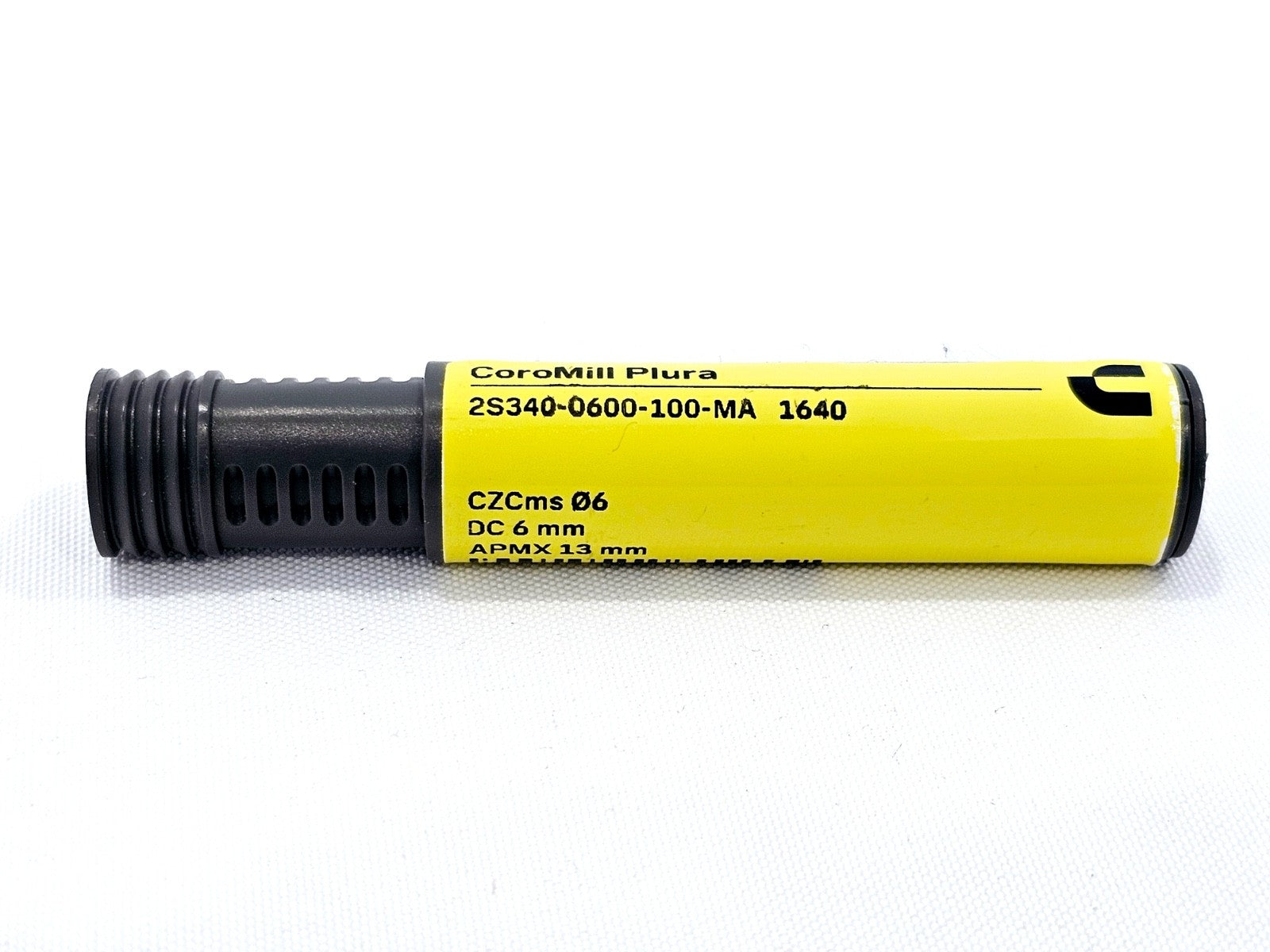 Sandvik CoroMill Plura 2S340-0600-100-MA 1640 canister label showing CZCms Ø6, DC 6mm, APMX 13mm specifications