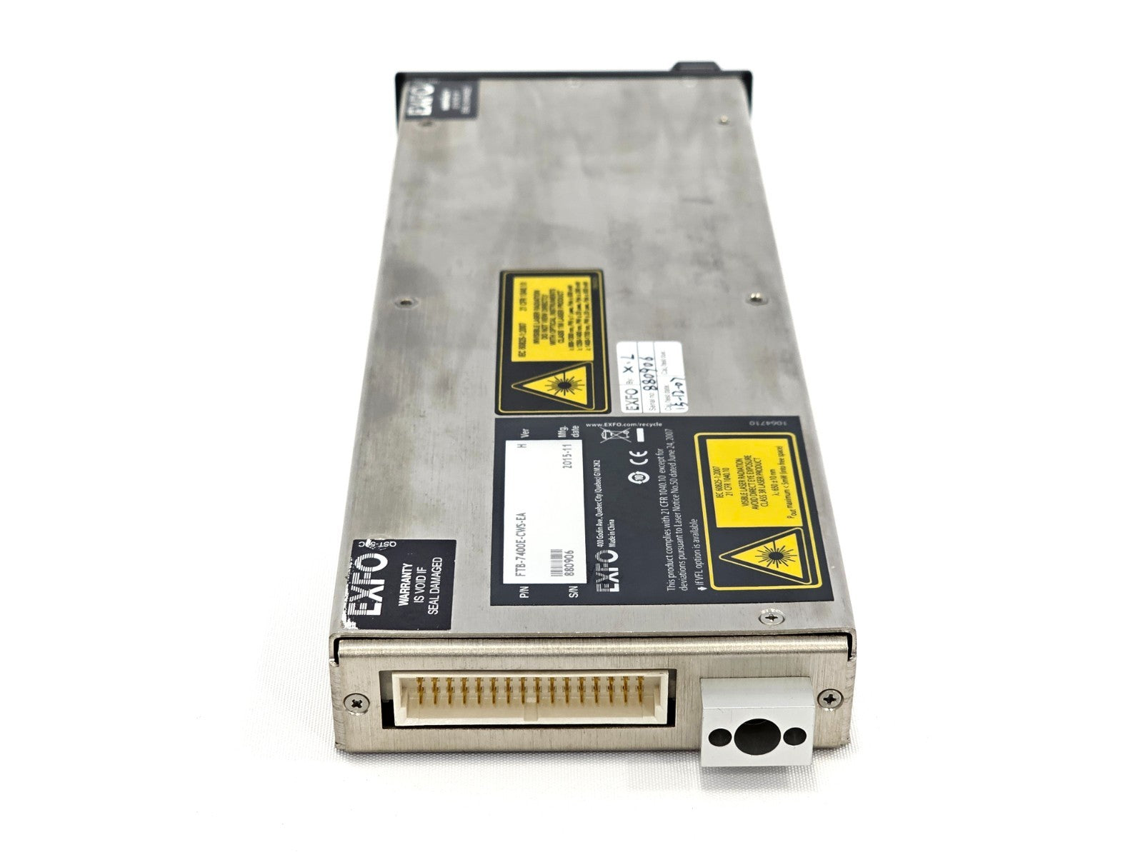 EXFO FTB-7400E-CWS OTDR module bottom view showing edge connector, power connector and product identification labels