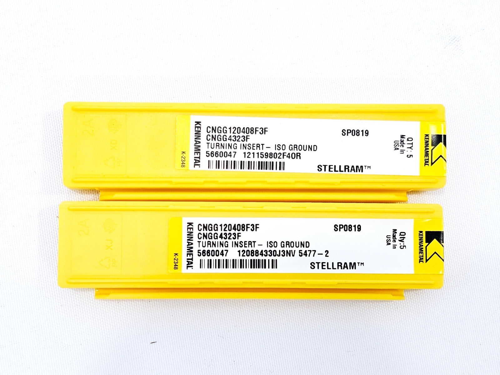 Two Kennametal CNGG120408F3F SP0819 Stellram insert pack lids showing product labels, qty 5 each, Made in USA