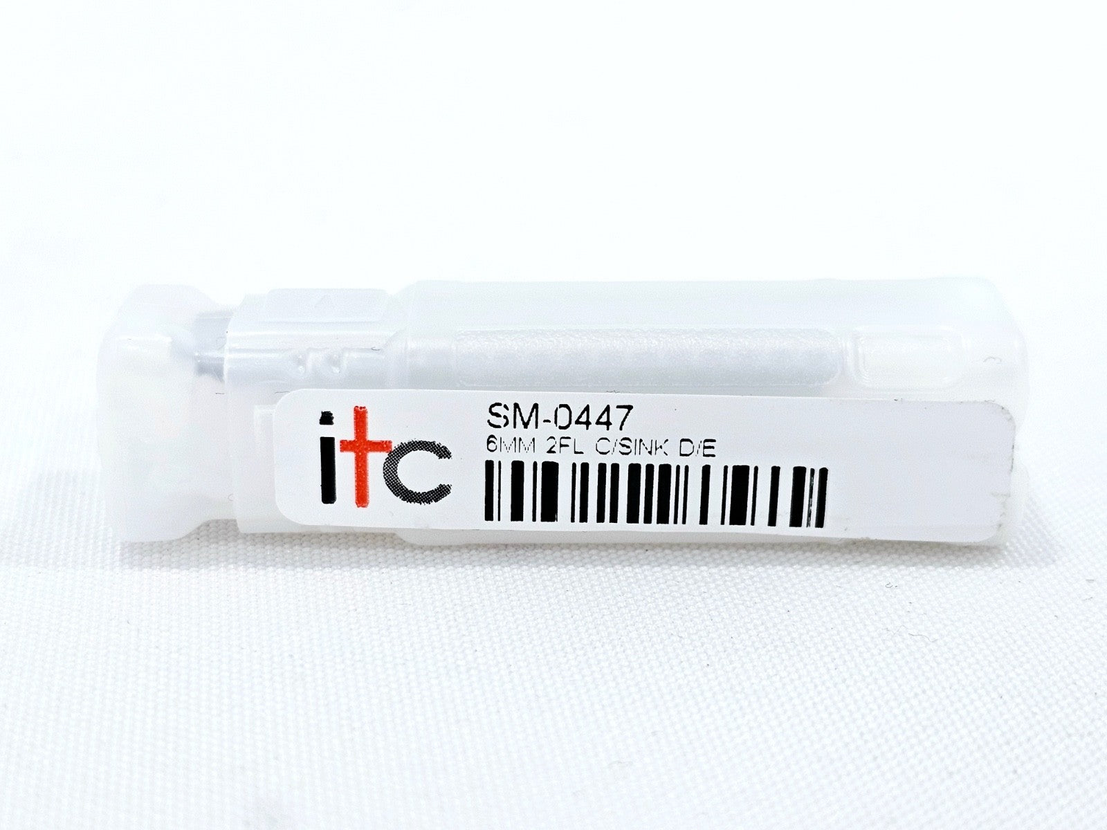 ITC SM-0447 6mm 2-flute countersink in white plastic tube showing barcode label with part number and description