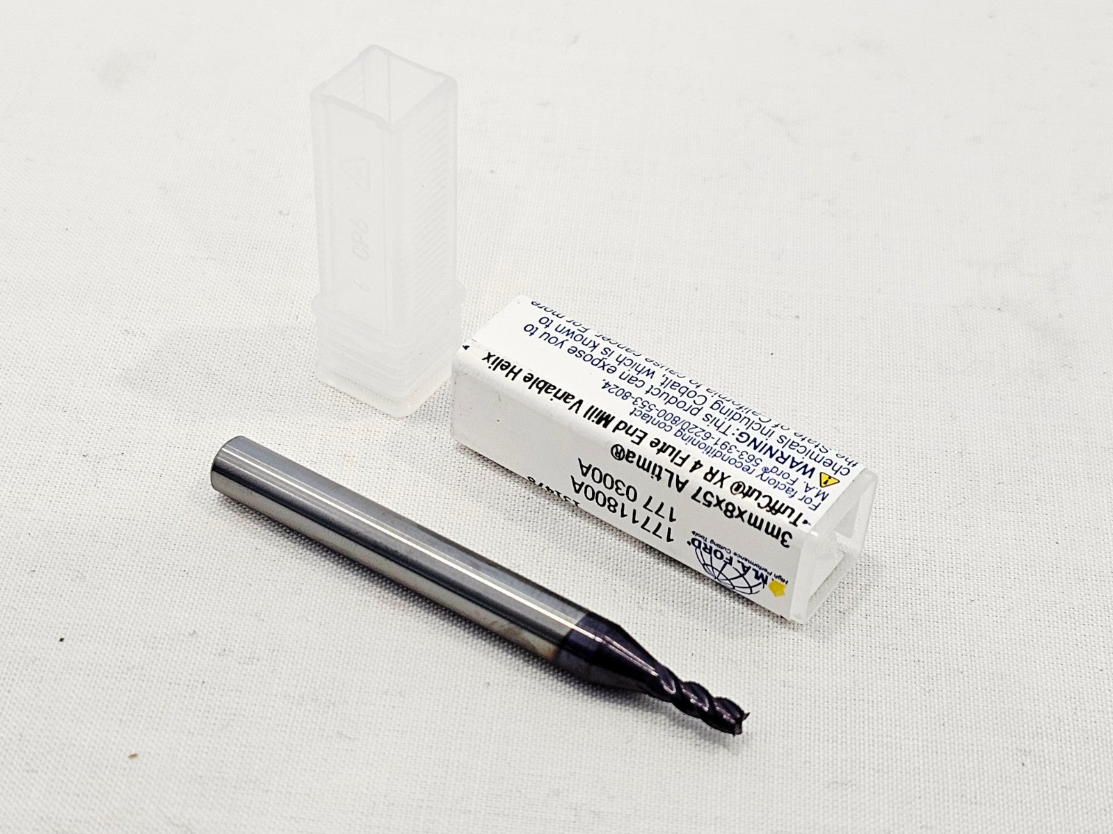 M.A. Ford TuffCut XR 17711800A 3mm carbide end mill removed from tube showing ALtima coated flutes