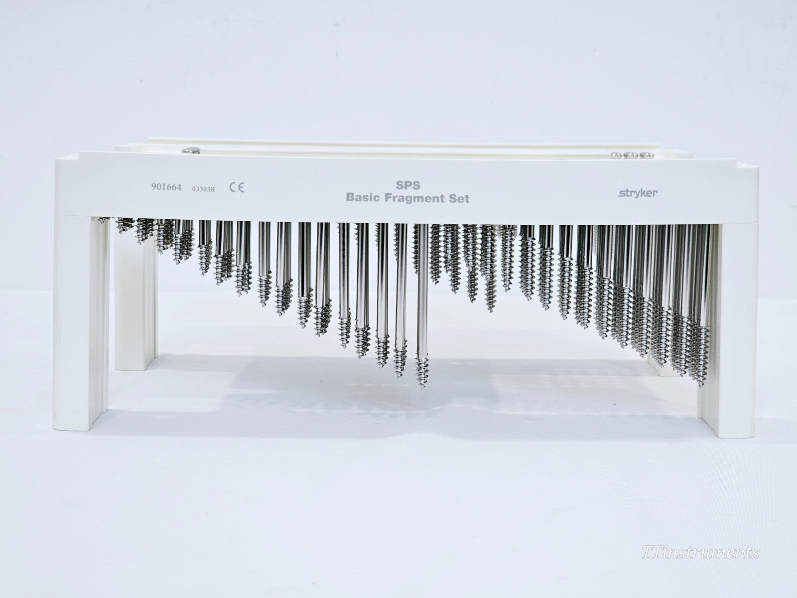 Stryker SPS Basic Fragment Set 901664 — front view of screw tray showing rows of stainless steel screws hanging below