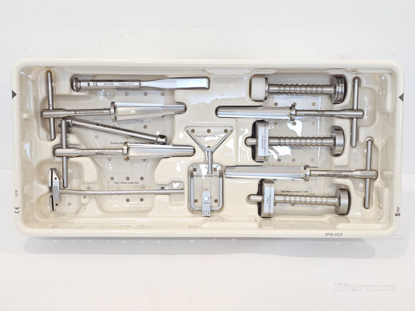 Close-up of Stanmore femoral cutting guides and alignment guides in instrument tray