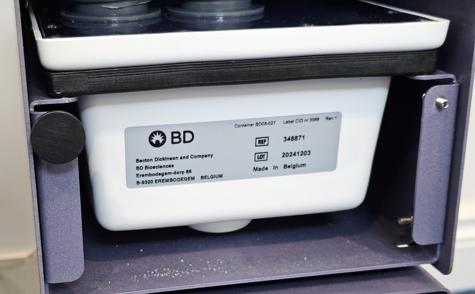BD FACSCelesta flow cytometer accessories including cables and tubing laid out
