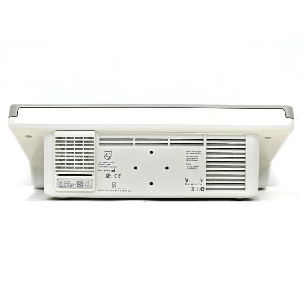 Rear of Philips IntelliVue 865220 charging station showing ventilation grilles, Philips label and CE marking