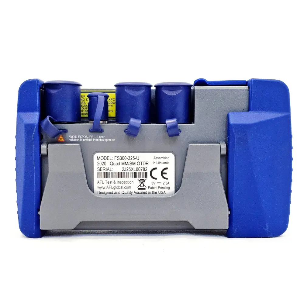 AFL FlexScan FS300-325-U rear label showing model number, 2020 Quad MM/SM OTDR, serial 2J25XL00782 and optical port caps