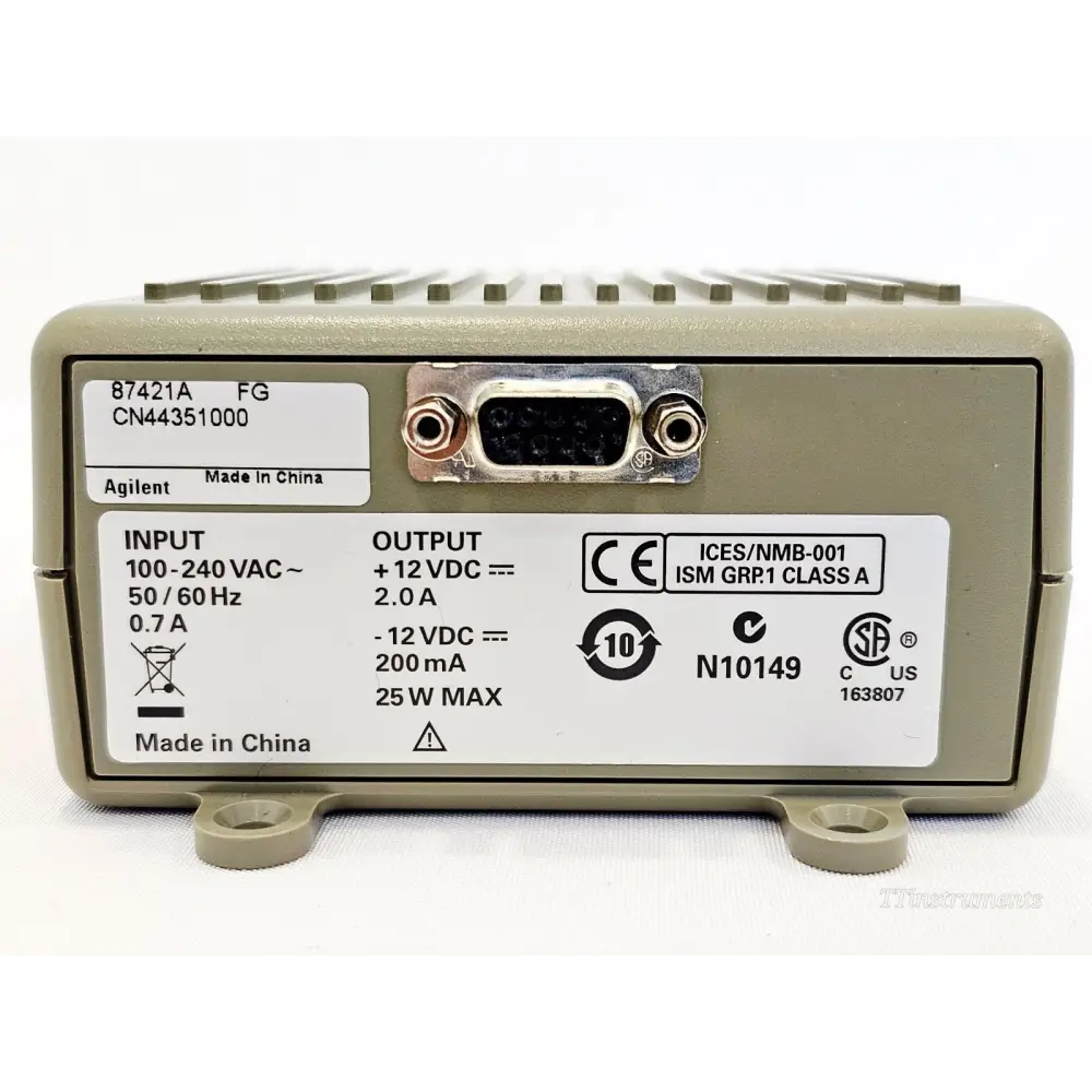 Agilent 87421A rear label showing input 100-240VAC, output +12VDC 2.0A, -12VDC 200mA, 25W, serial CN44351000