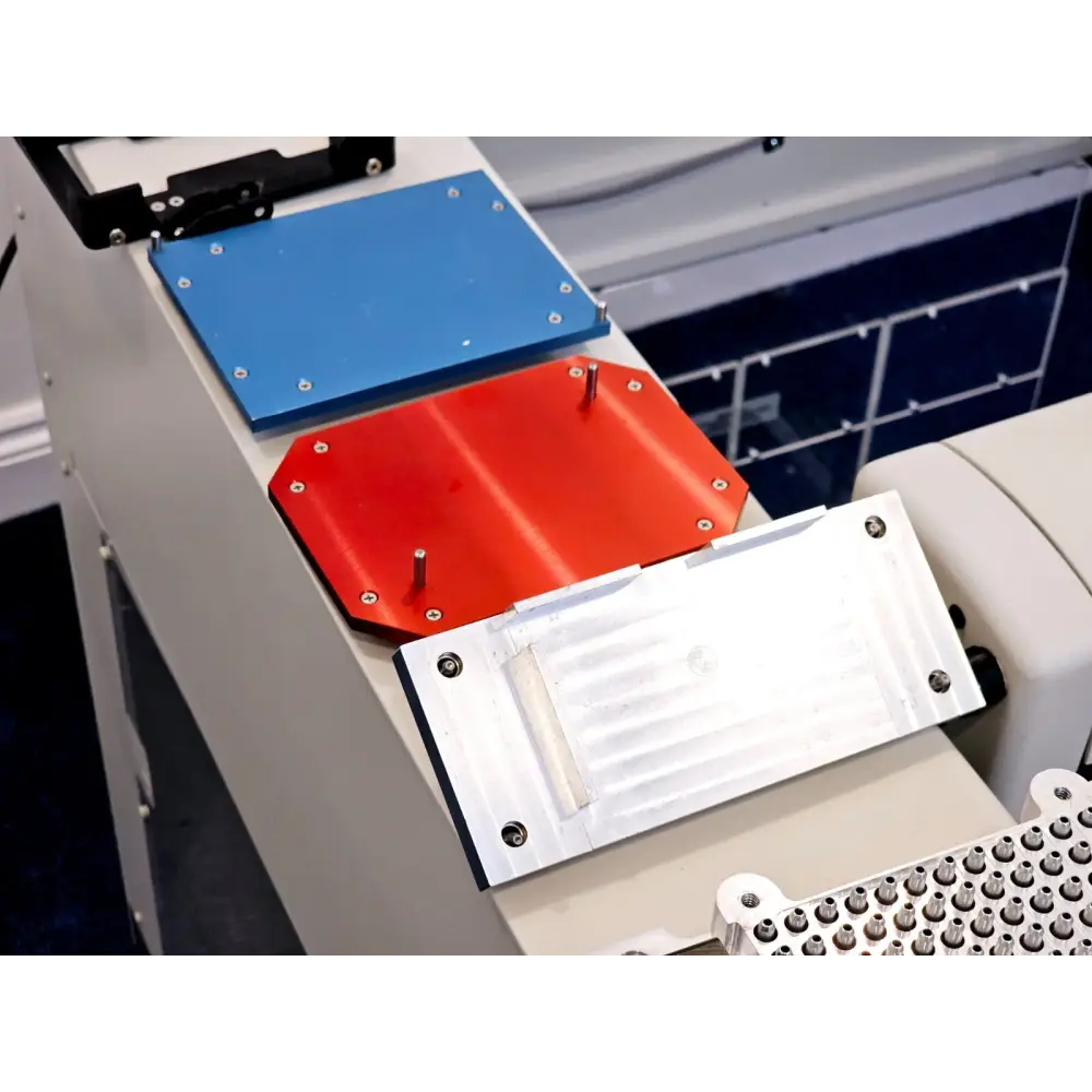 Beckman Coulter Biomek NXP pipetting head docked position detail showing tip ejection mechanism