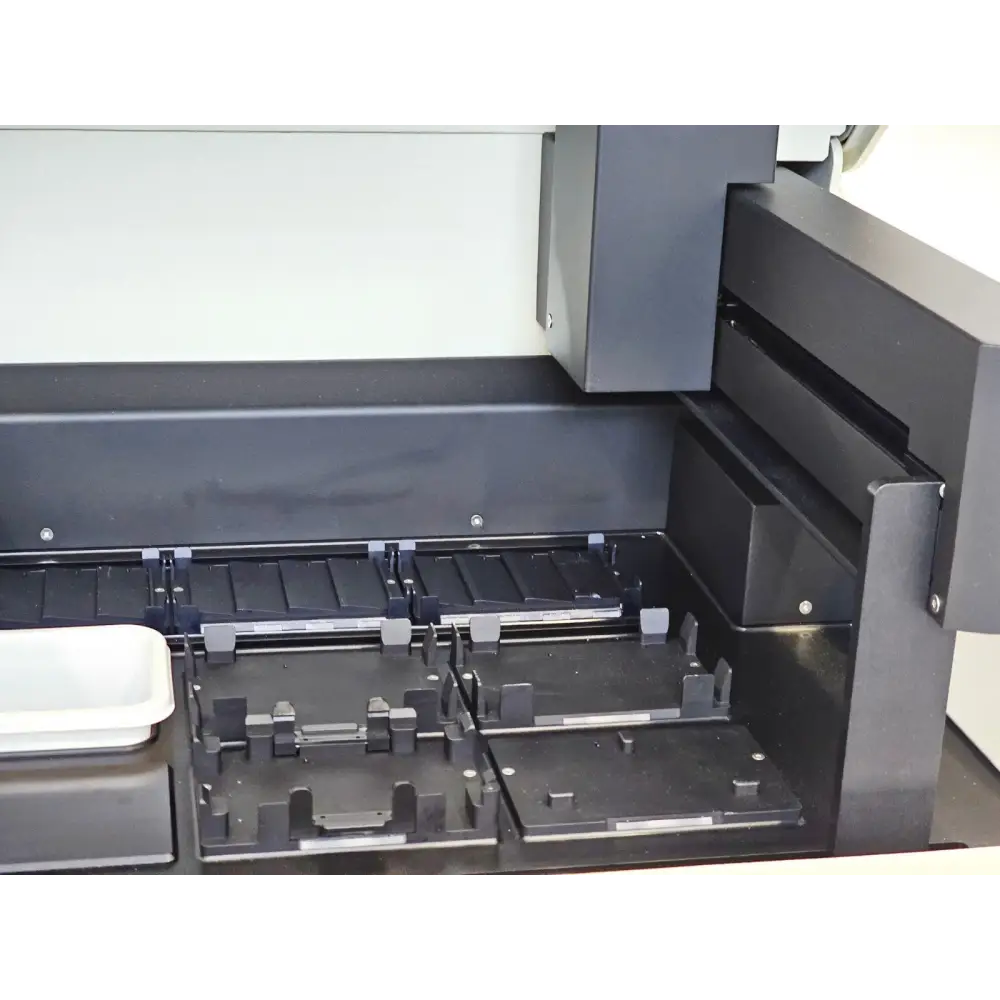 Bio-Rad AutoDG internal deck close-up showing DG32 cartridge holders, sample plate positions and droplet generation head