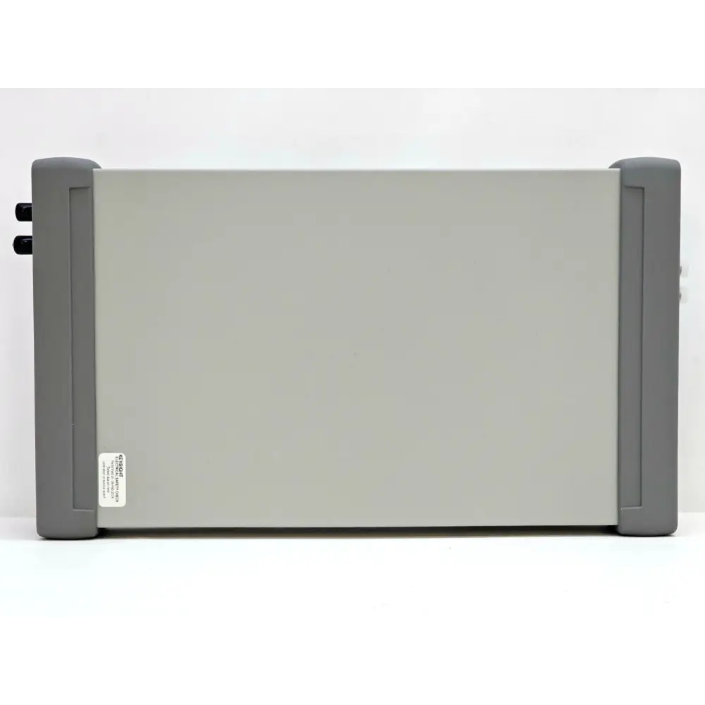 Keysight N7751A left side panel showing grey chassis and Keysight regulatory compliance label