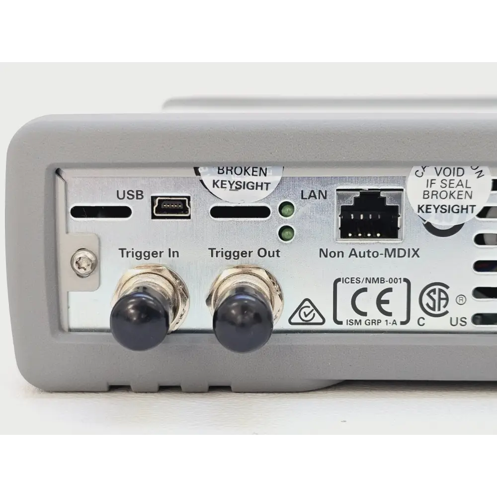 Keysight N7751A rear panel close-up showing USB Mini-B, LAN RJ45, Trigger In and Trigger Out BNC connectors
