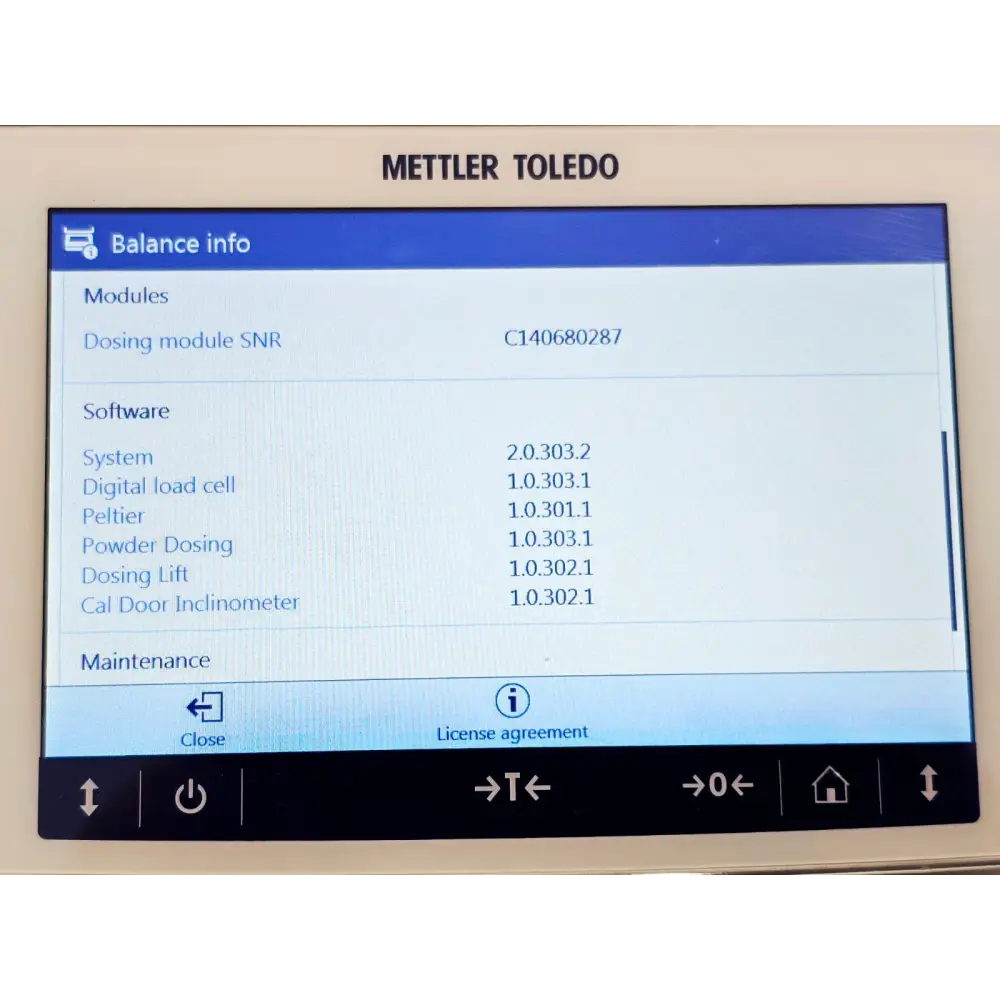 Mettler Toledo XPR226DRQ balance dosing head detail showing automated dispensing nozzle