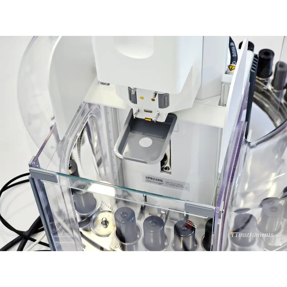 Mettler Toledo XPR226DRQ balance with sample vessels for automated liquid dispensing