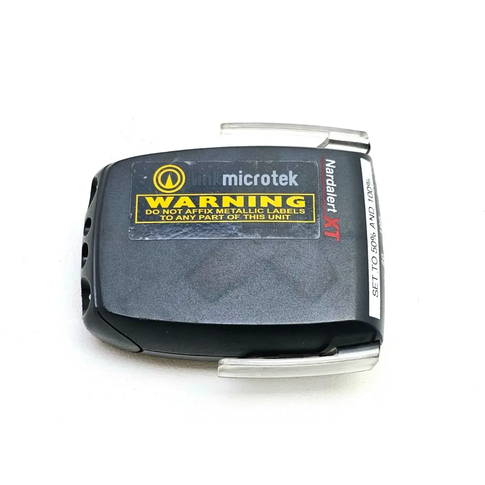 Nardalert XT D8860 body-worn RF monitor showing clip and sensor housing detail