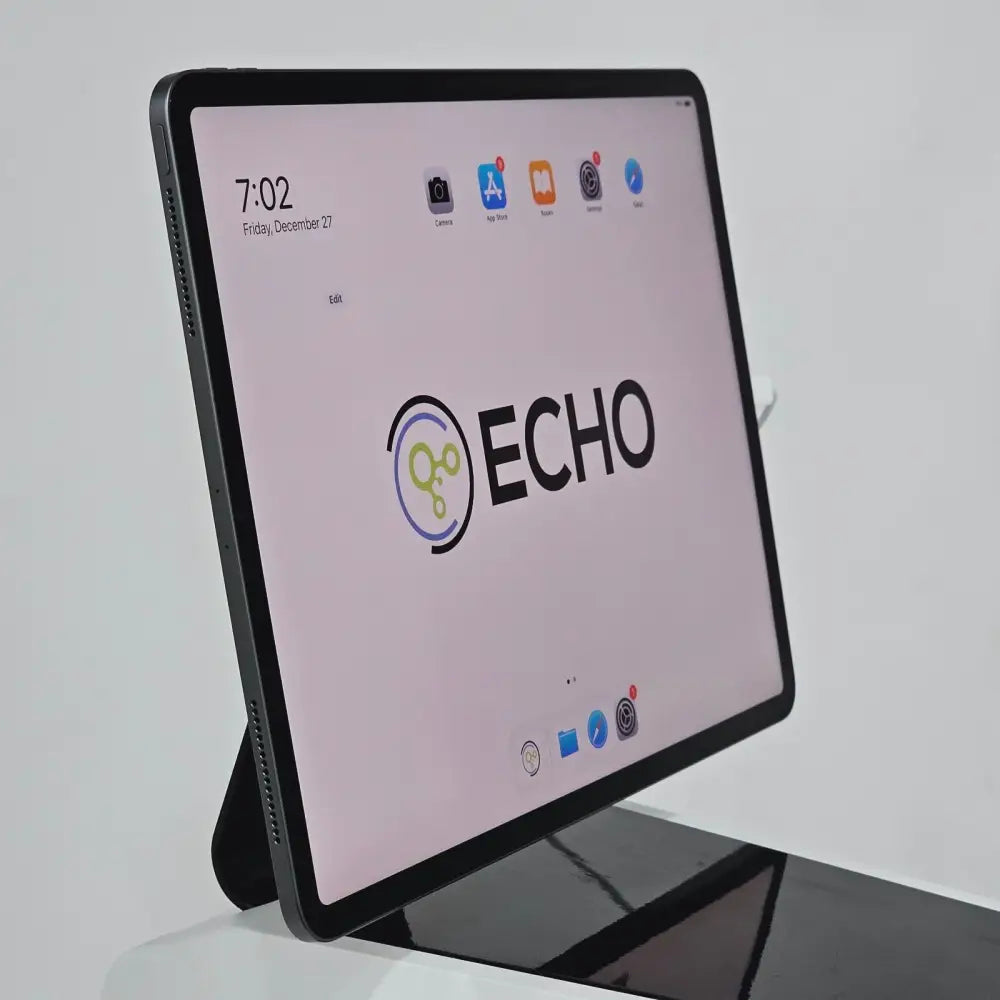ECHO Rebel iPad 4th generation display showing ECHO Pro app home screen on microscope stand mount, angled view