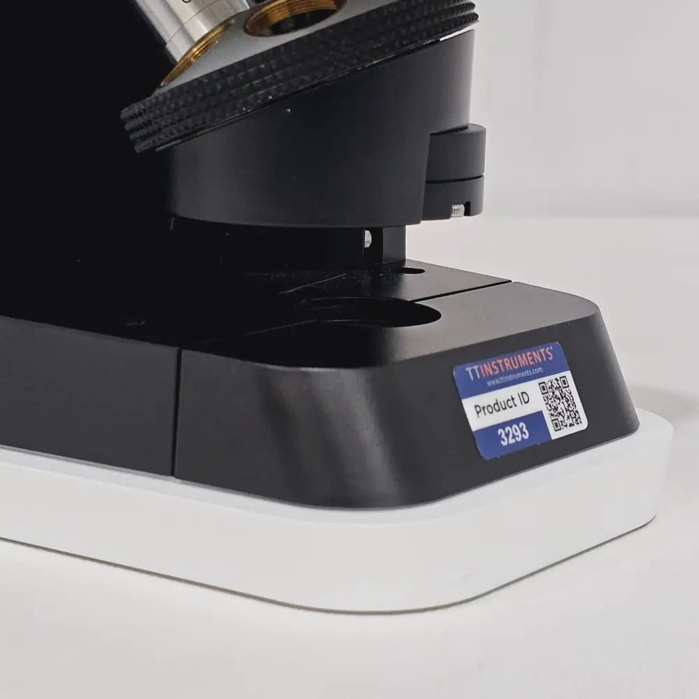 ECHO Rebel REB-01-D microscope base close-up showing TT Instruments Product ID label 3293 and focus mechanism
