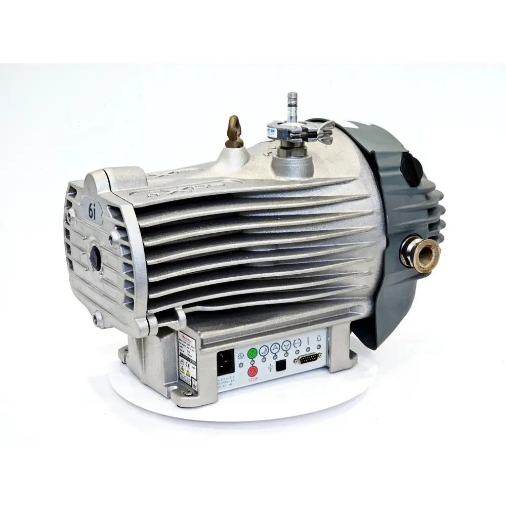Edwards nXDS6i dry scroll vacuum pump A735-01-983 — front-left 3/4 view showing ribbed aluminium body, control panel, NW25 exhaust port and Ralston gas ballast fitting
