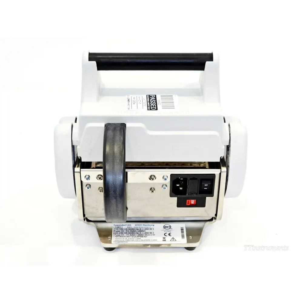 Eppendorf 5391 HeatSealer S100 rear view showing IEC power inlet, voltage selector switch, fuse holder, and regulatory label