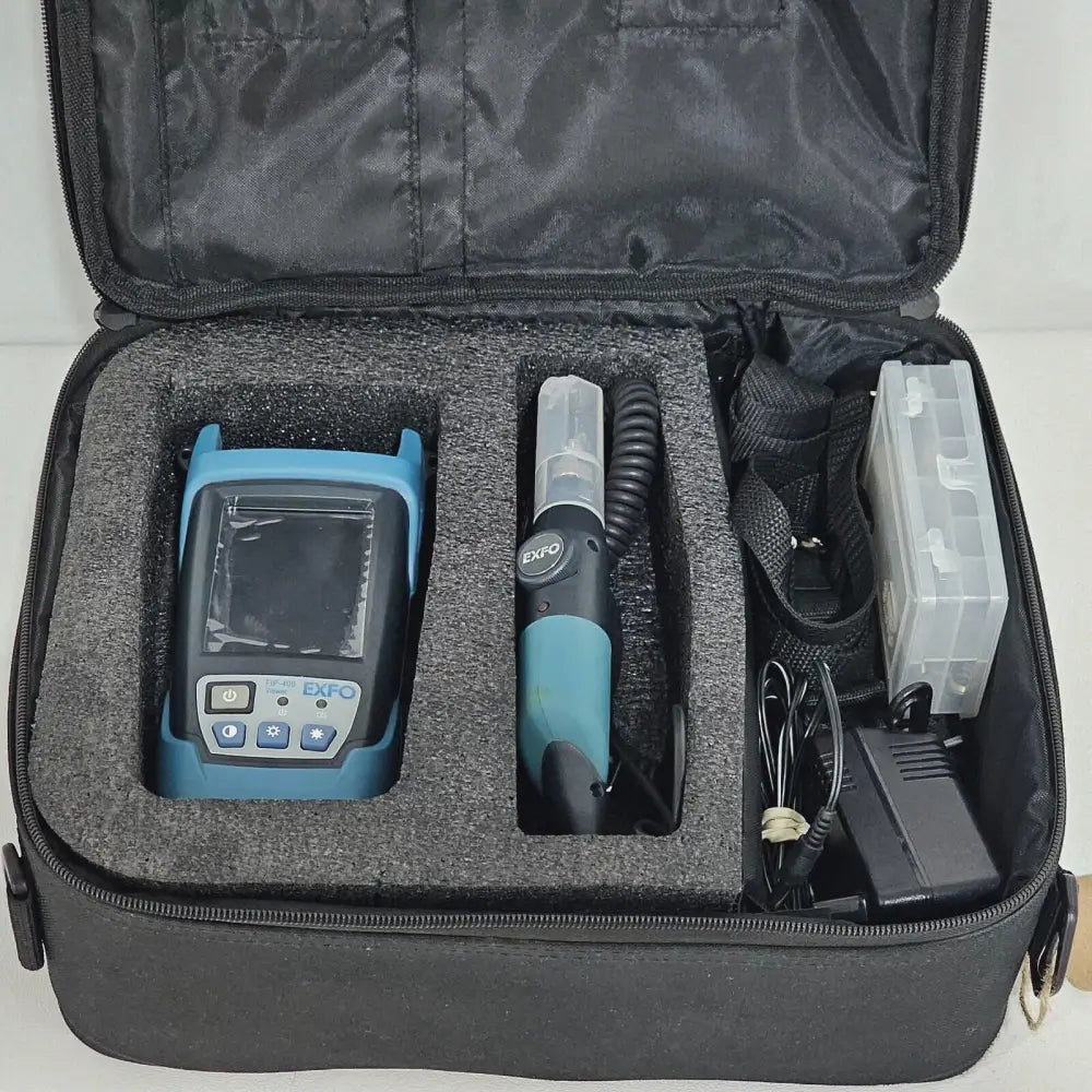 EXFO FIP-400 complete fibre inspection kit laid out with all included accessories and tips