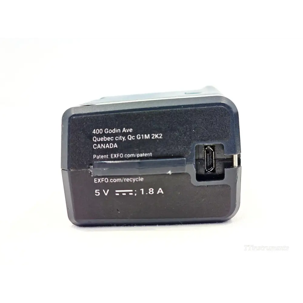 EXFO FIP-435B EU USB power adapter close-up showing 5V 1.8A rating and micro-USB charging port