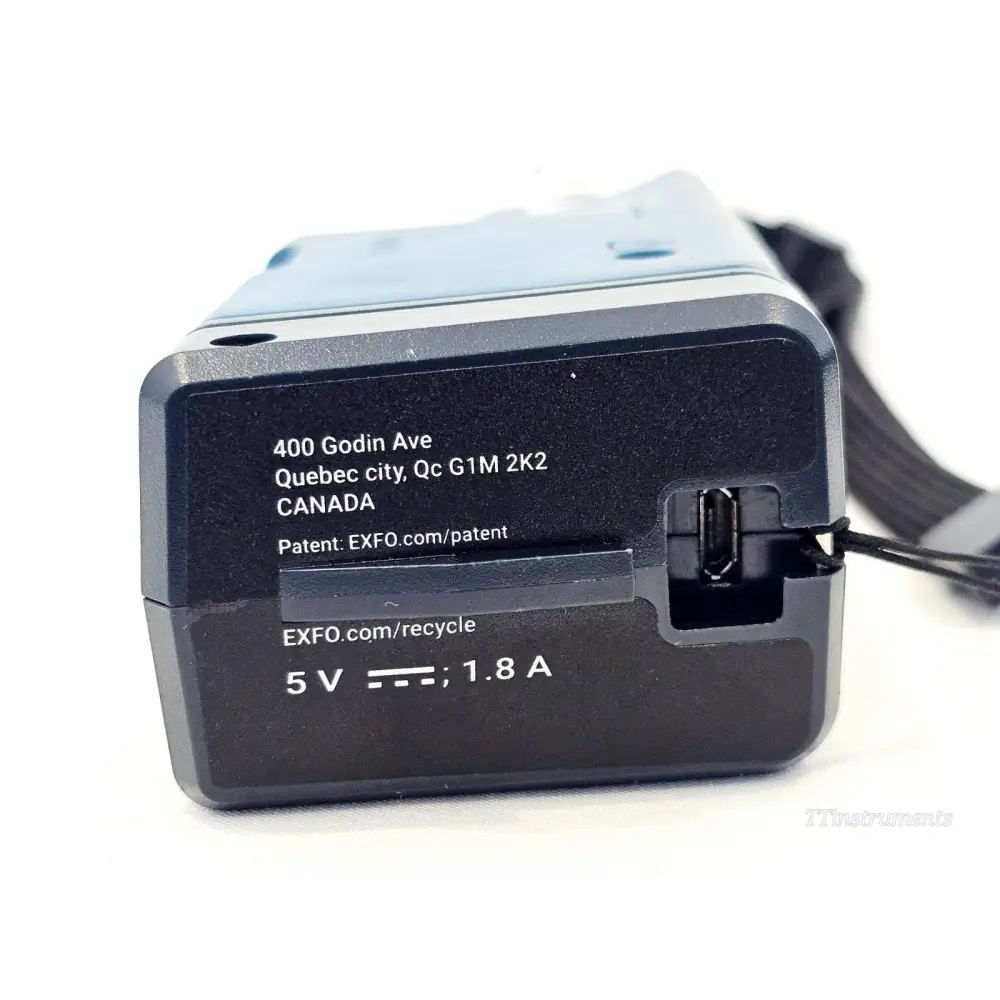 EXFO FIP-435B rear end showing micro-USB charging port and 5V 1.8A power rating label, Quebec City EXFO address