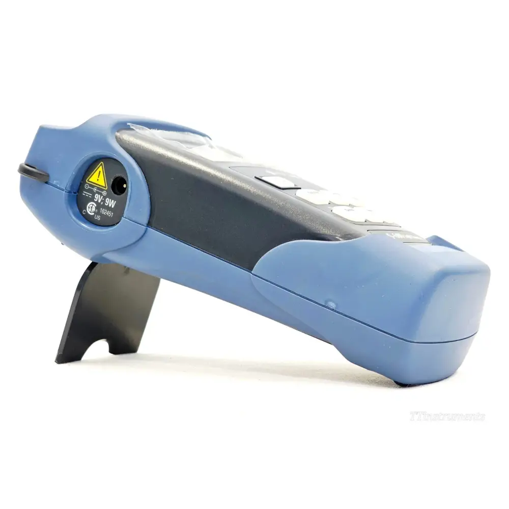 EXFO FLS-600 left-side view showing 9V 9W power input jack, CSA certification mark and instrument stand