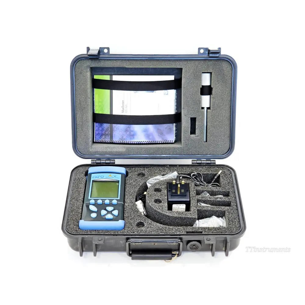 EXFO FOT-922 MaxTester kit open in hard carry case showing unit, AC adapter, VFL, manuals and accessories