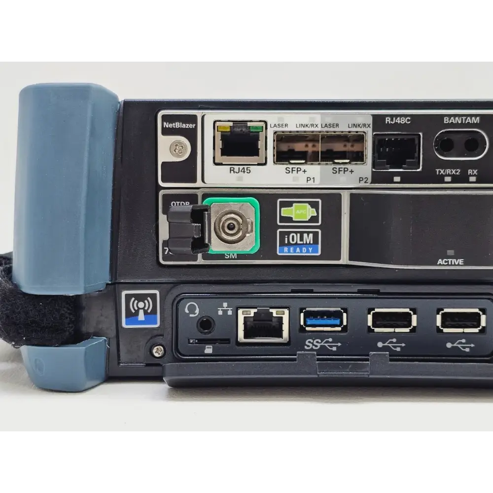 EXFO FTB-1 Pro FTB-730Gv2 SM8 OPM OTDR with power adapter and stylus laid out on a surface