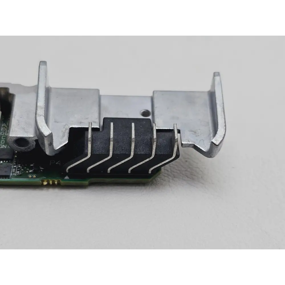 EXFO FTB-1 Pro battery connector board end showing finned metal battery contact assembly and green PCB components