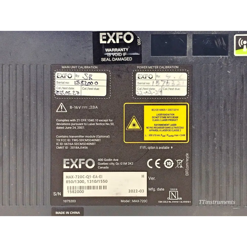 EXFO MAX-720C-Q1 rear label close-up showing model, serial number 1582000, calibration dates and wavelength config