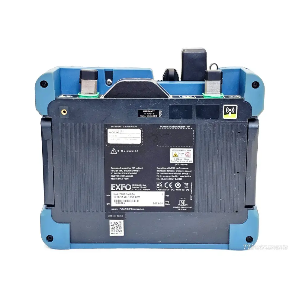 EXFO MAX-730C-SM8 rear label showing model MAX-730C-SM8-EA, S/N, 1310/1550/1650 LIVE, Mfg Date 2023-01 and regulatory marks