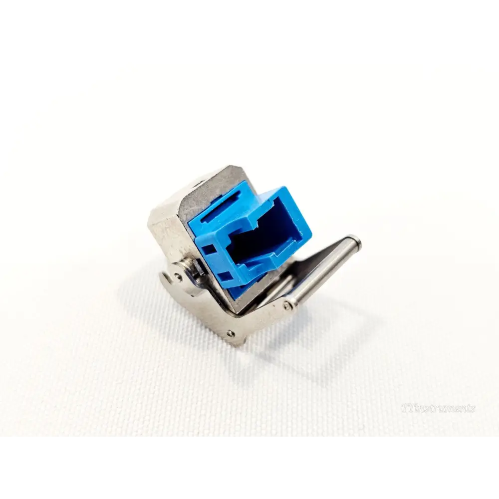 LC PC OTDR adapter connector for Anritsu Viavi JDSU — angled view showing blue LC housing, open port cavity and steel clip
