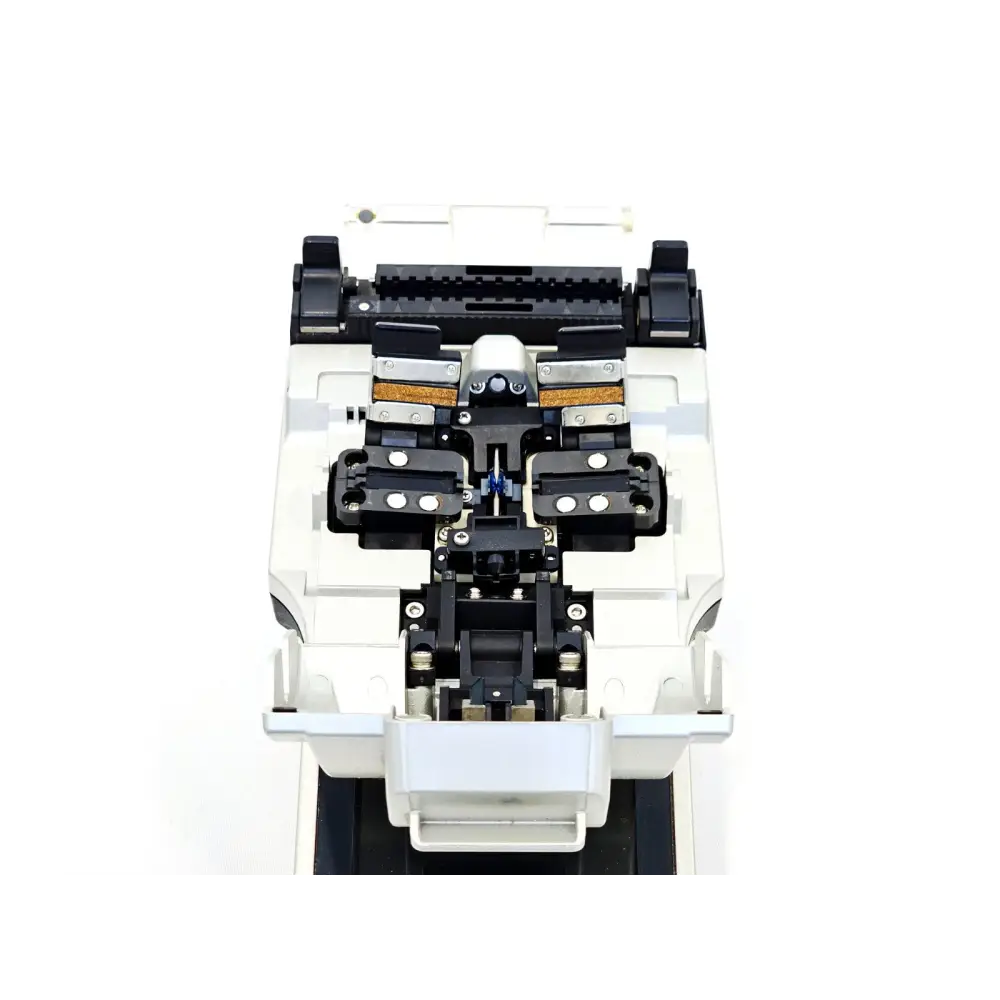 Fitel S177A top-down view of open splice chamber showing fibre clamps, electrodes, and alignment mechanism