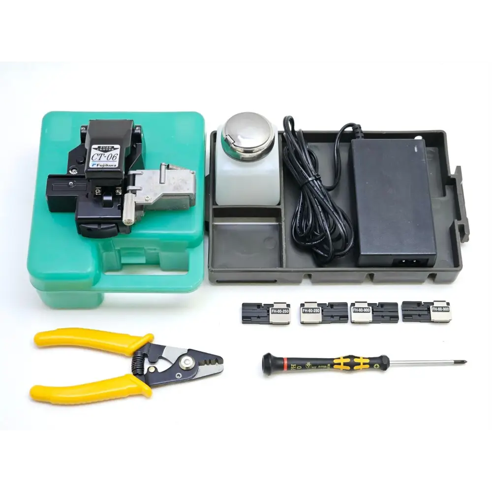 Fujikura 12S fusion splicer V-groove fiber alignment bay with electrodes visible