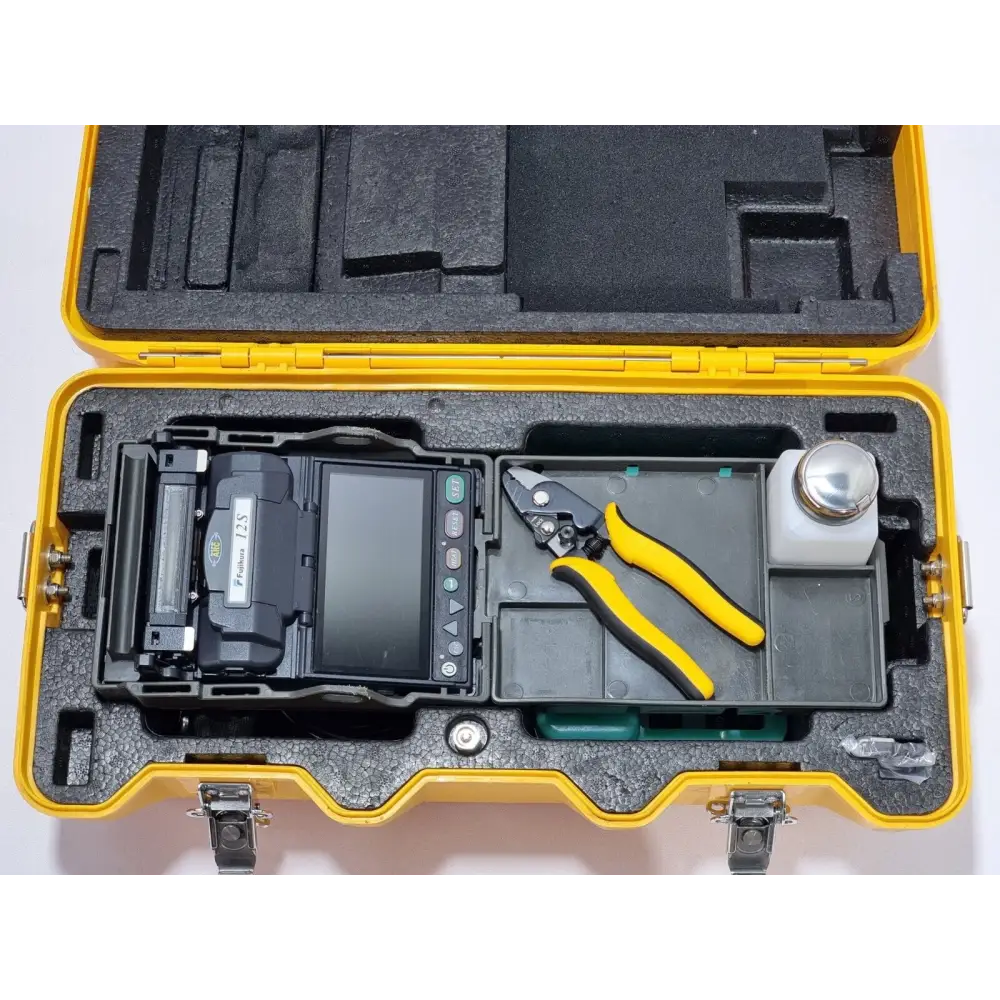 Fujikura FSM-12S fusion splicer showing V-groove and electrode assembly