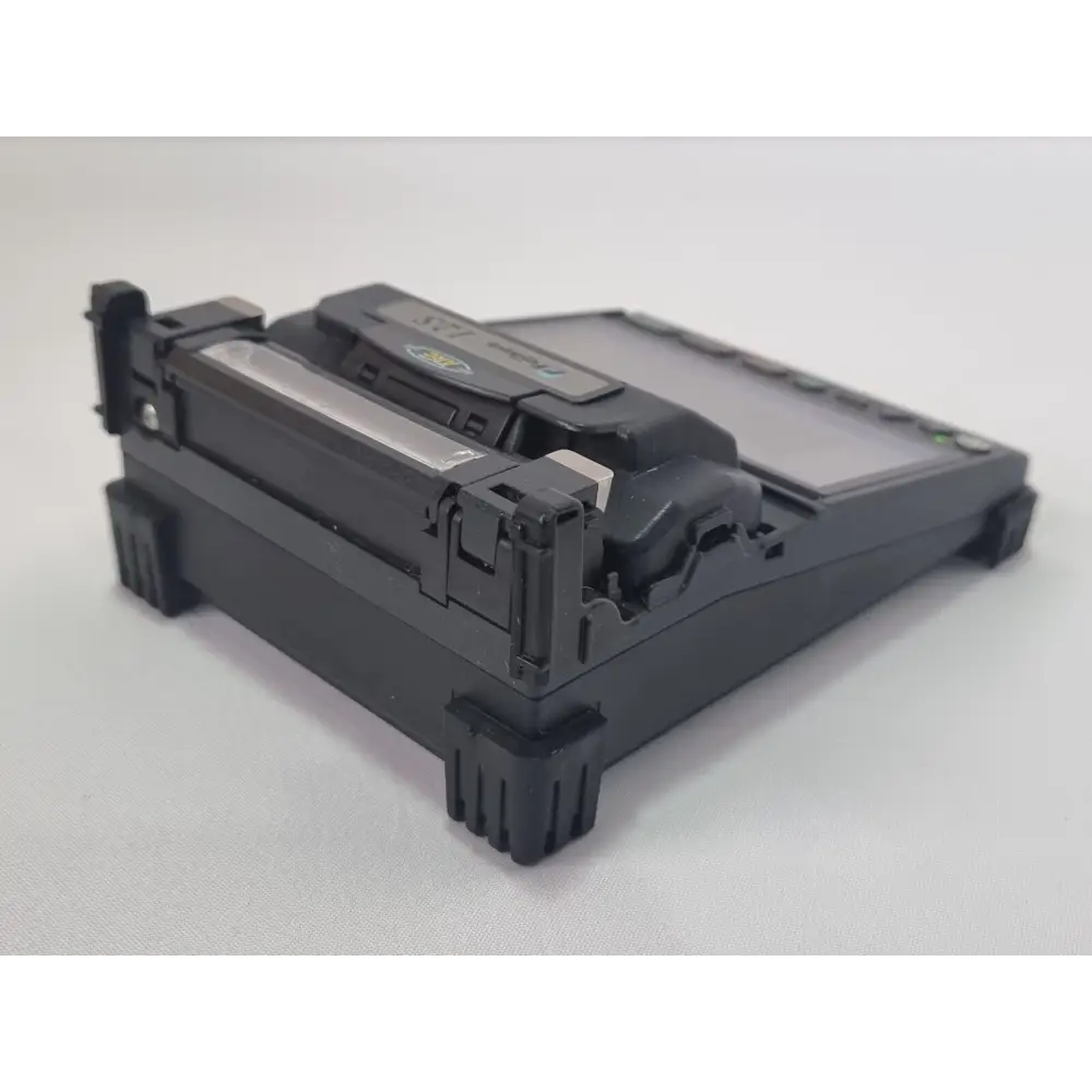 Fujikura FSM-12S splicer right side profile showing ports and controls