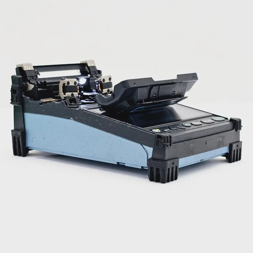 CT-30 fiber cleaver detail showing cutting blade and fiber channel