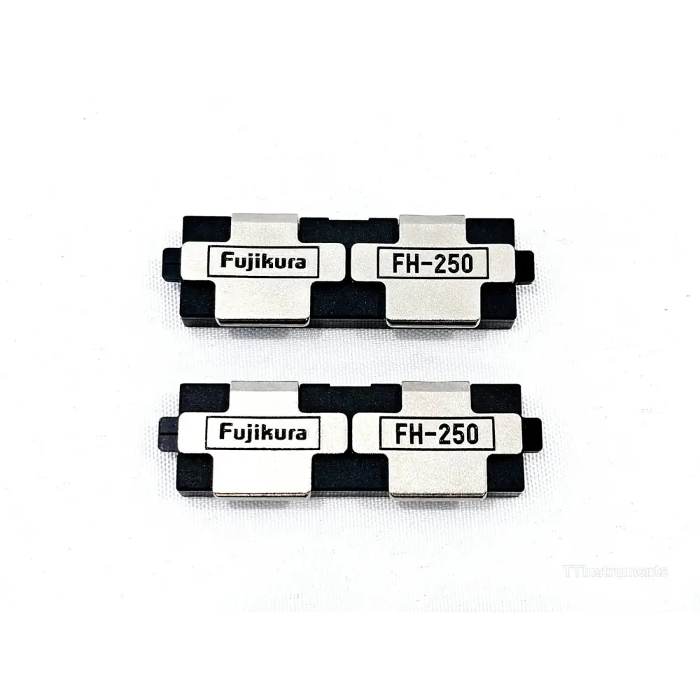 Fujikura FH-250 fibre holder clamp pair — top view showing both holders with branded metal plates