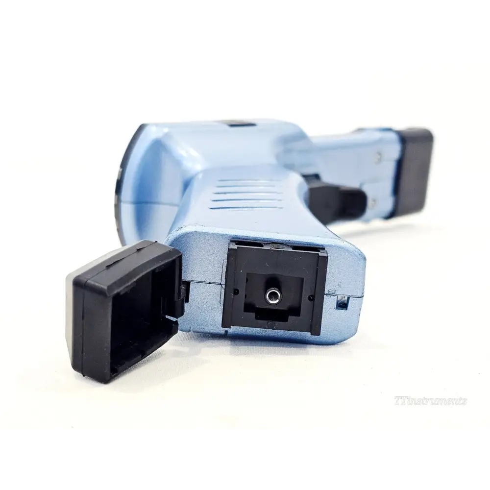 Fujikura FID-30R — rear battery compartment open showing DC input port and battery bay