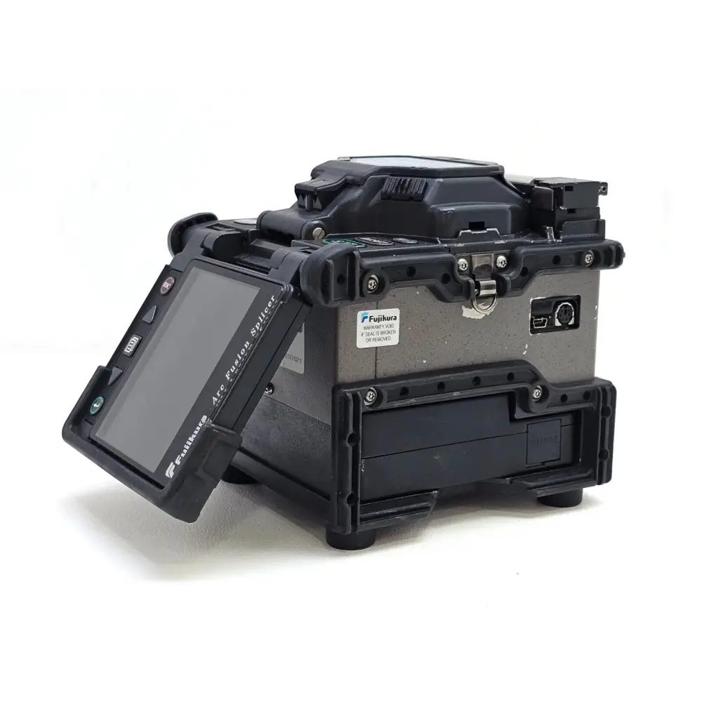 Fujikura FSM-60S splicer top view showing wind guard and fibre clamp mechanism