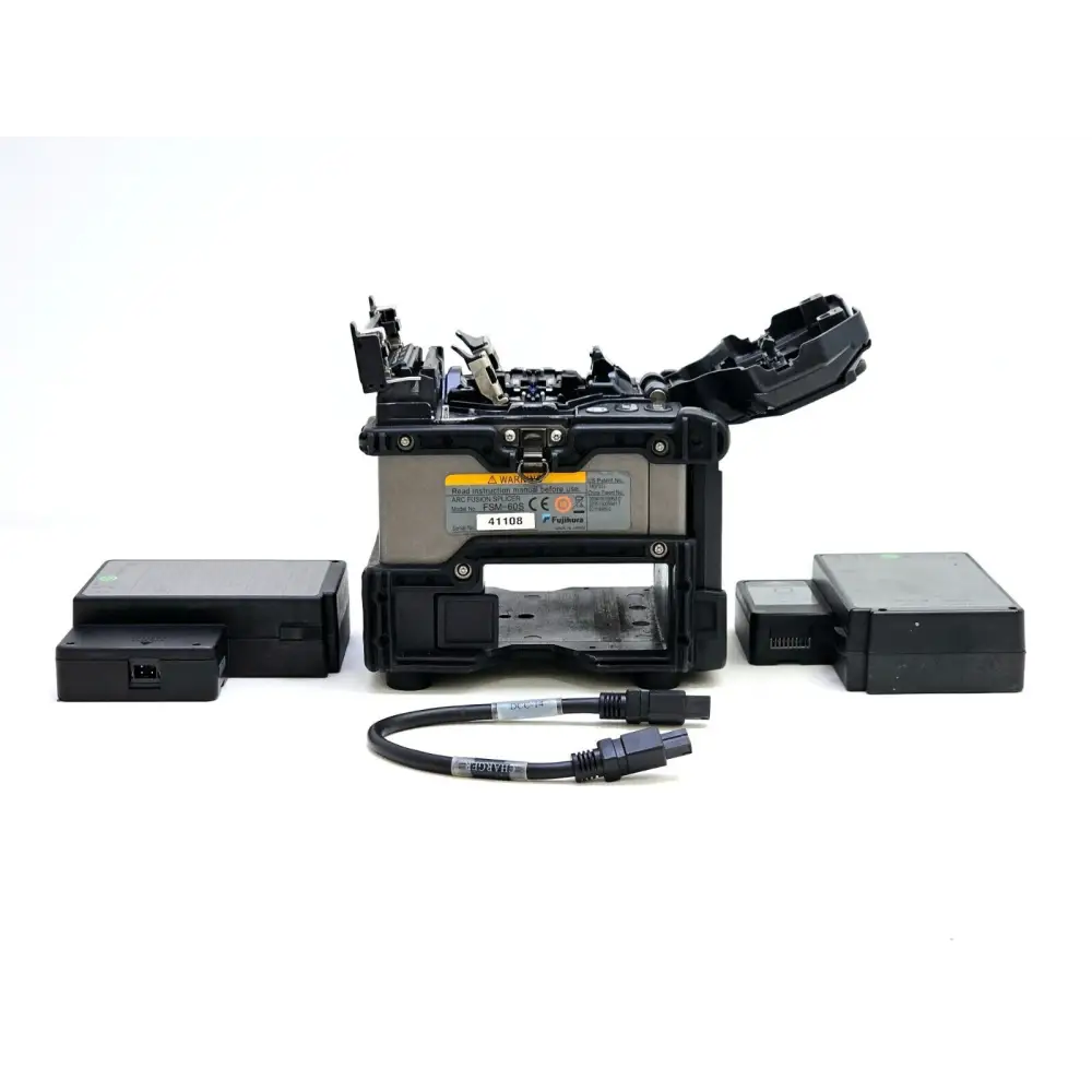 Fujikura FSM-60S splicer with lid open showing V-groove fibre alignment area