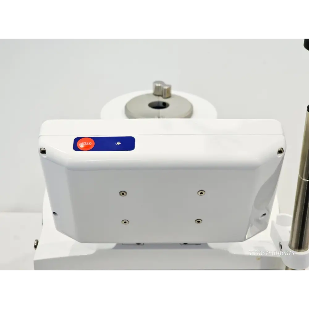 Sepax C-Pro top panel close-up showing STOP button, blue indicator and centrifugation chamber assembly