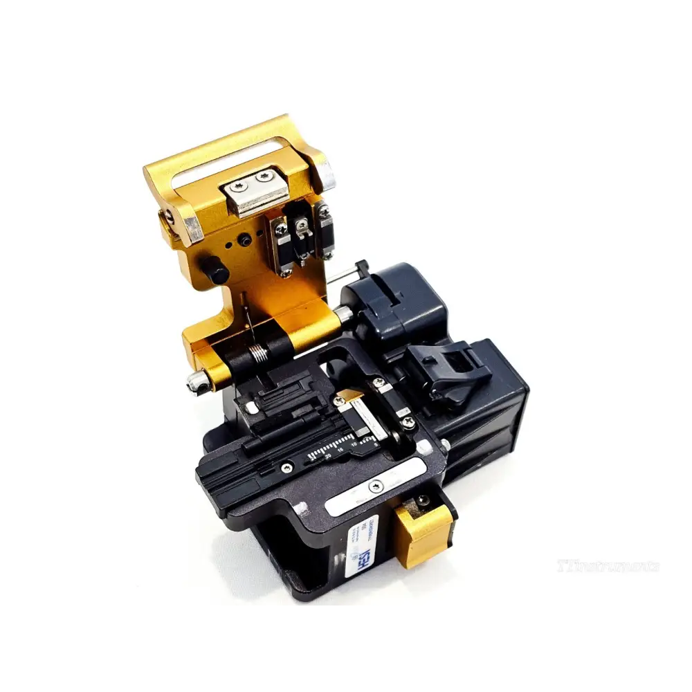 INNO V7 fibre cleaver open showing internal blade mechanism, fibre channel, measurement scale and clamping arms