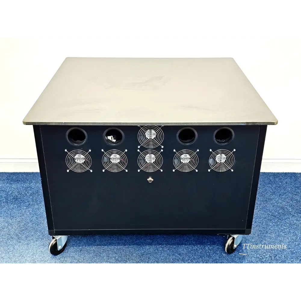 ionBench BCH120NE78 rear panel showing 5 cooling fans and 4 circular exhaust ports for vacuum pump heat management