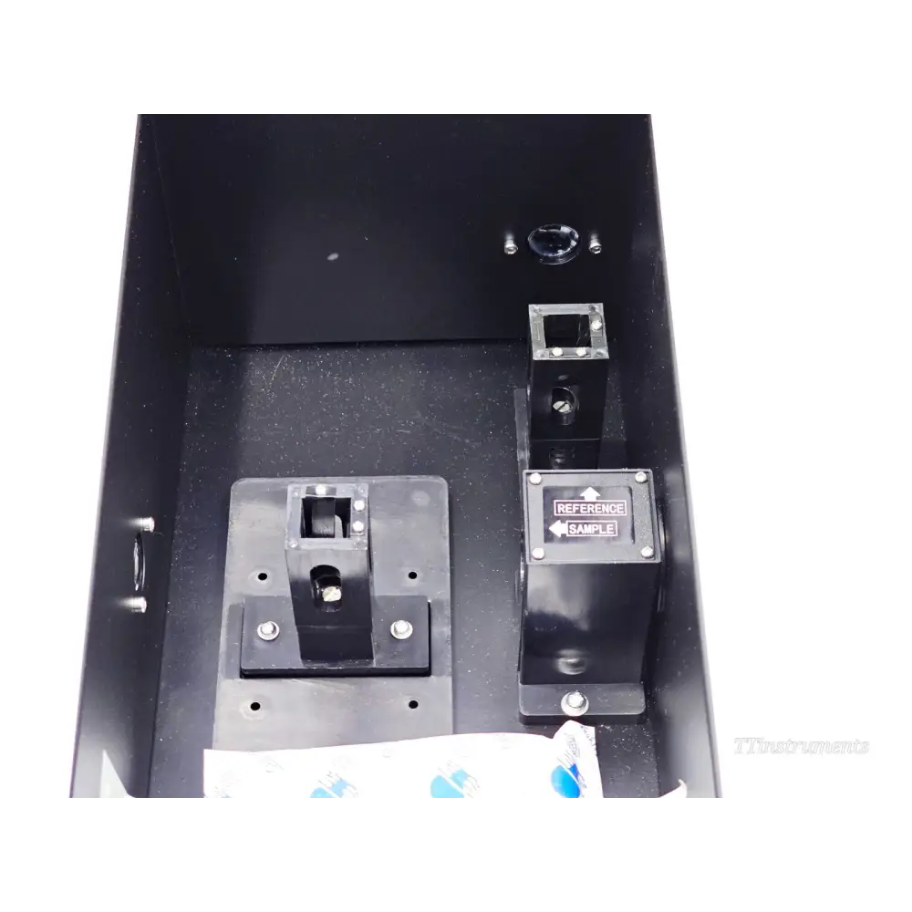 Jenway 6850 open sample compartment showing dual cuvette holders with Reference and Sample labels and standard 10x10mm cell mounts