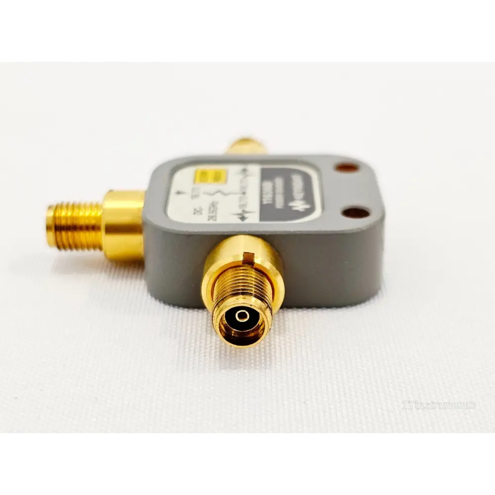 Keysight 11636B Power Divider angled side view showing input SMA port and grey body with product label