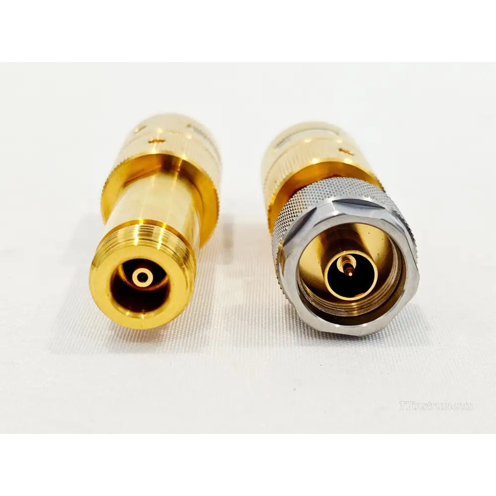 Keysight 85130C adapters showing Type-N female and Type-N male connector ends — gold and silver finish